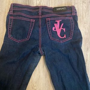 hot pink vintage contrast stitching dark wash low rise flare leg versace jeans